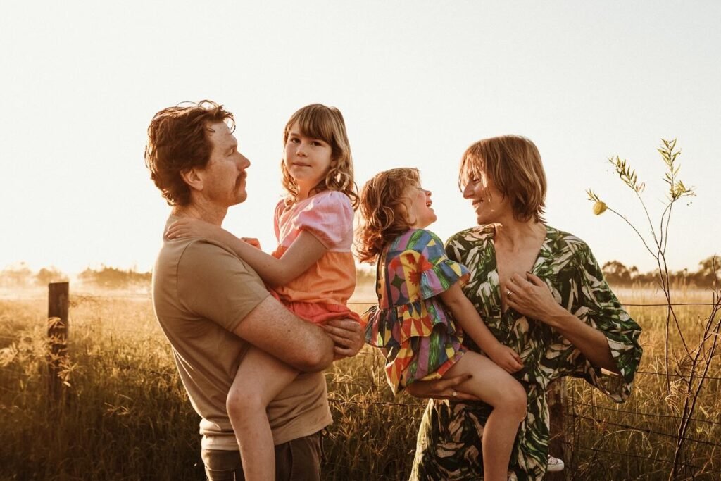 Parents With Children On Lap