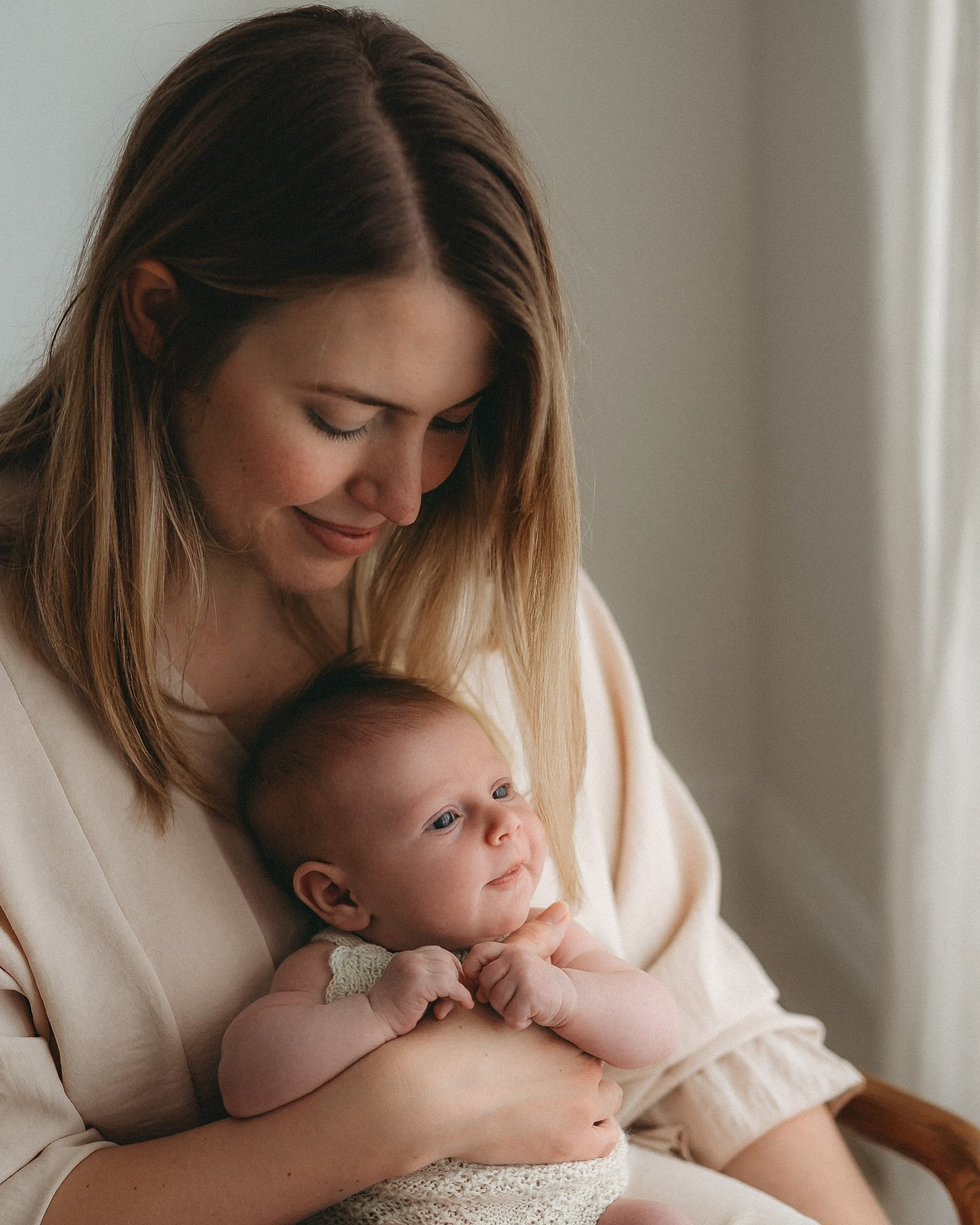 Newborn On Mother's Lap