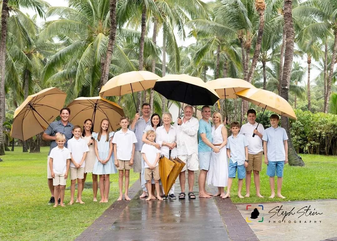 Group Under Umbrellas