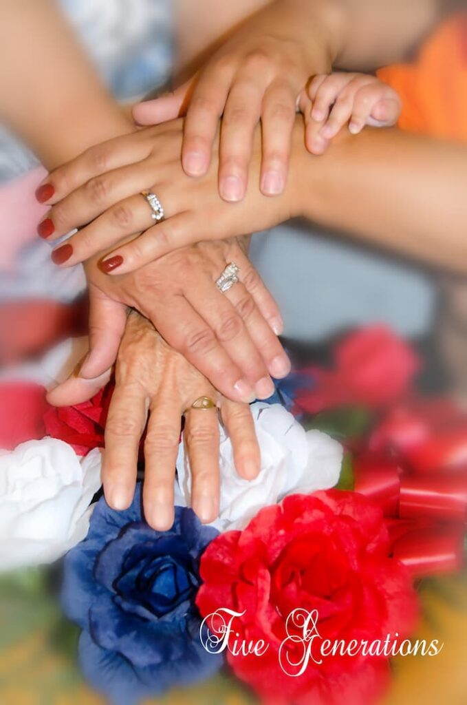 Hands Stacked Across Generations
