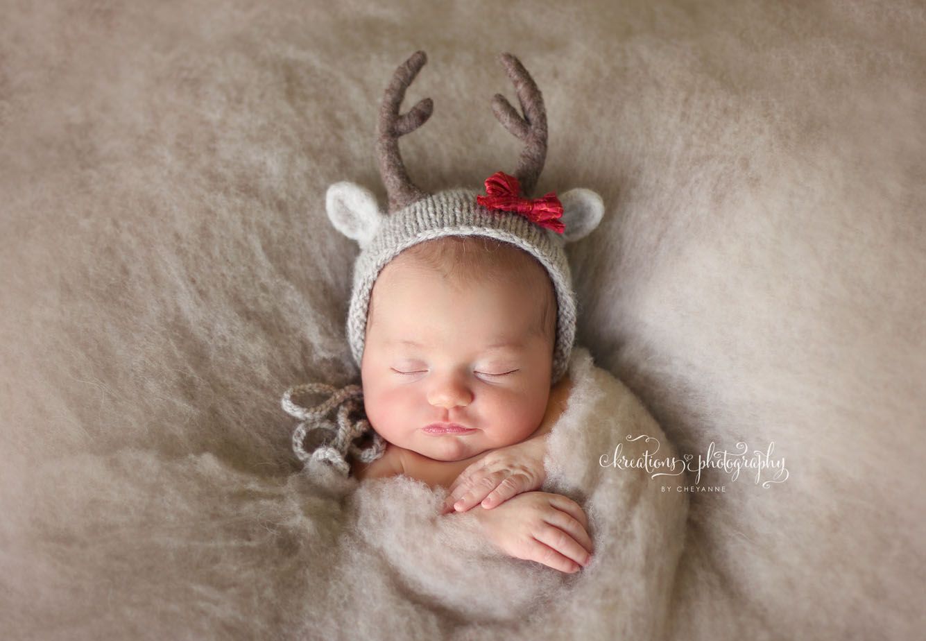 baby's first christmas photo shoot
